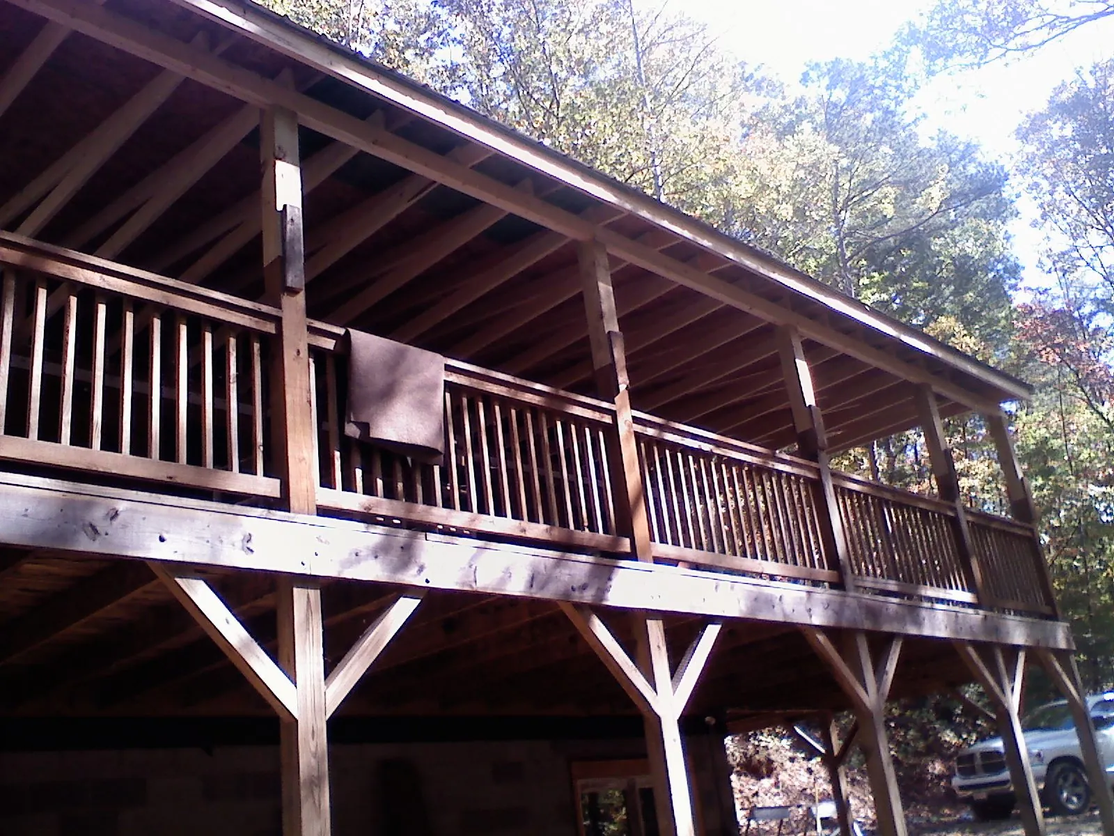Timber framing under a new elevated porch and deck — Roof Leak Repair in Amagansett by Roofing Brothers